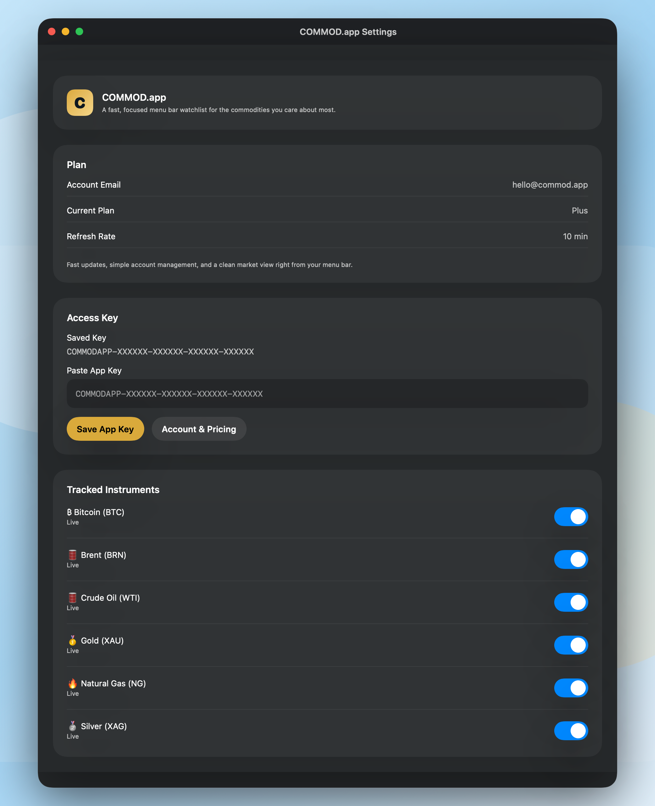 COMMOD.app settings window with account and tracked instruments